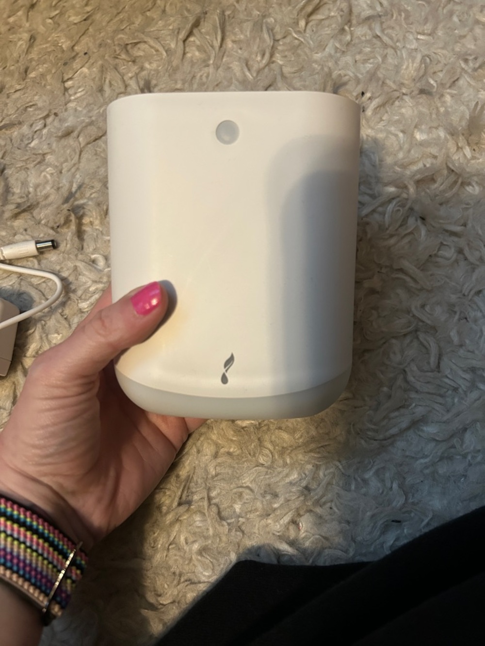 White Essential Oil Diffuser with Subtle Flame Logo